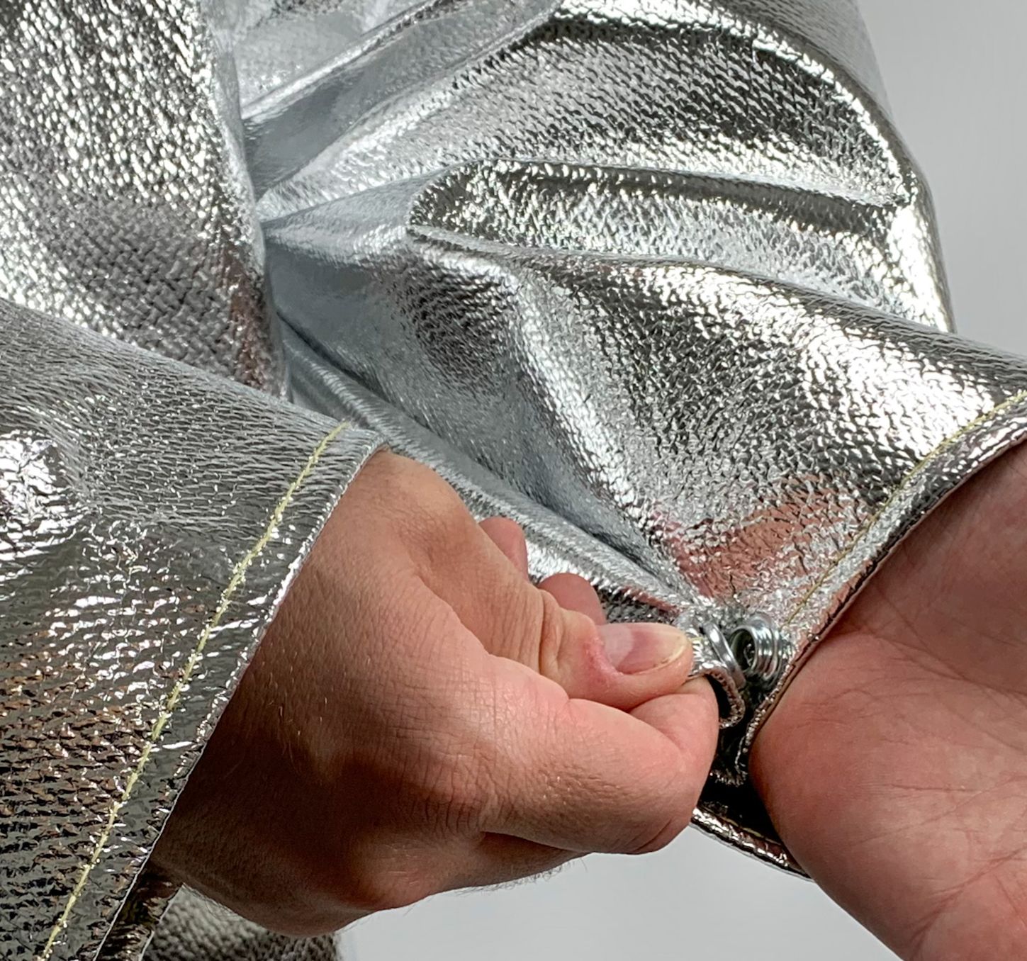chicago-protective-apparel-564-ack-aluminized-carbon-kevlar-open-back-coat-19-oz-example.jpg